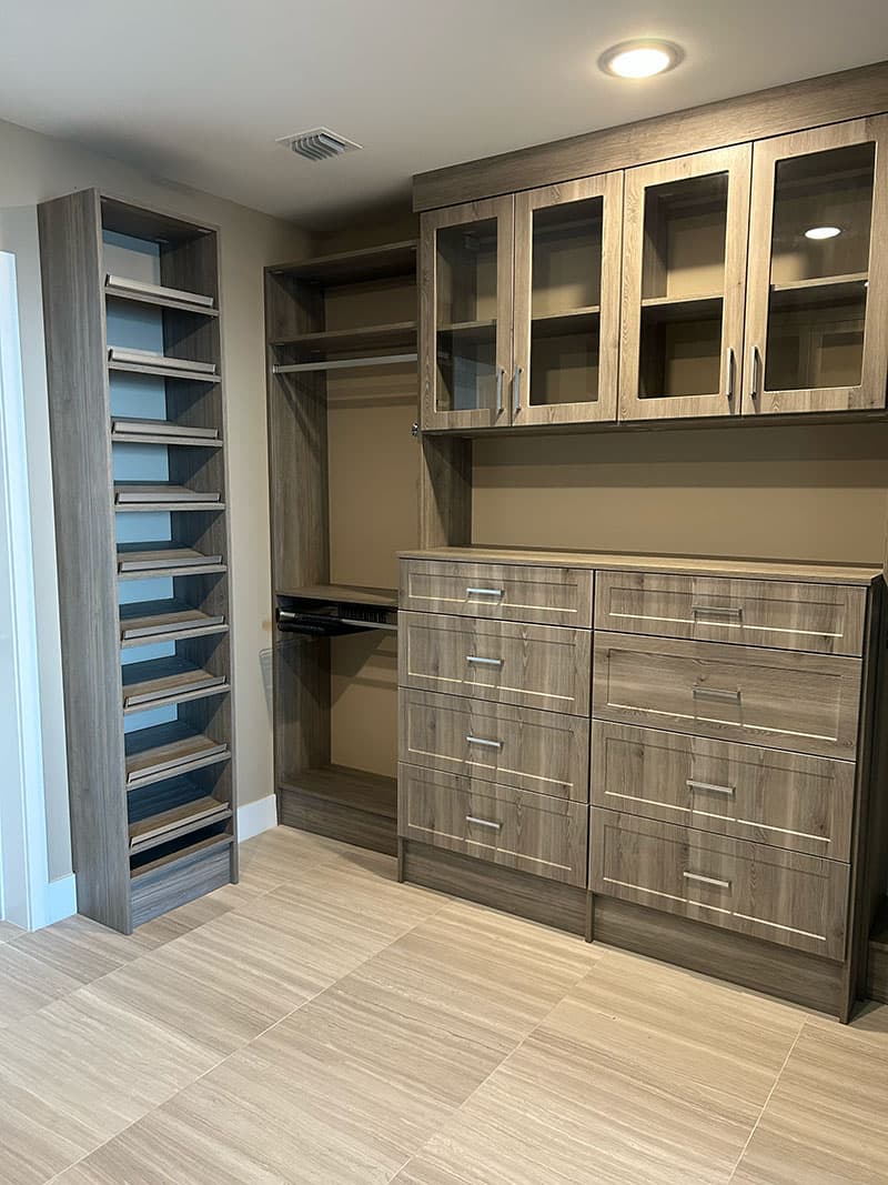 Storage wall with glass-front cabinets